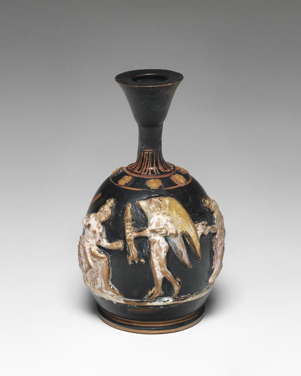 An image of Vessel. Squat lekythos, with Aphrodite, Eros and bride. Find Spot: Panticapaion, Crimea, Russia. Production Place: Athens. Clay, red-figured, height 0.135 m, diameter 0.07 m, 390 BC. Classical Greek Period. Lewis Collection.