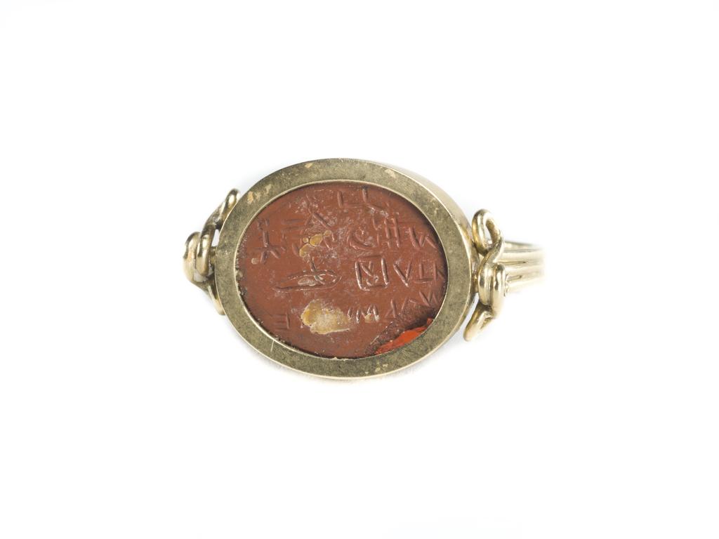 An image of Engraved gems. Magical amulet. Obverse: Serapis and Isis. Reverse: Inscription. Intaglio cutting, jasper, 101-300 AD. Roman.