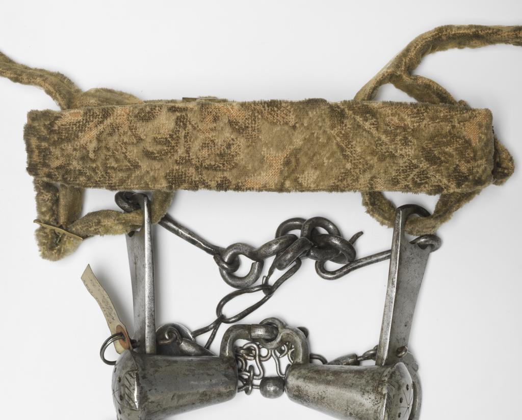 An image of Armour. Bridle component. Steel bit, with original bridle and reins covered with yellow velvet. Unknown production, Germany. Circa 1500-1550. POST-CONSERVATION.