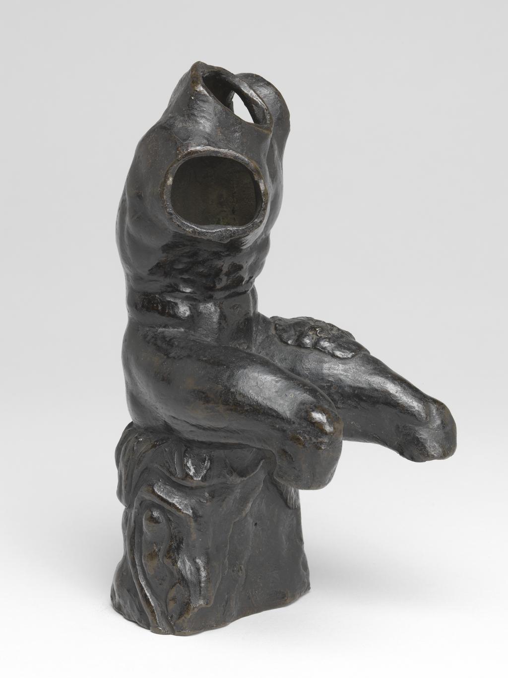 An image of Sculpture. Torso of the Belvedere. Adapted as Hercules with lion skin. Bronze, cast, height, whole, 19.6 cm, circa 1500- 1600. Italian. Notes: An adaptation of the antique marble torso in the sculpture court of the Belvedere in the Vatican. The lion skin is a reference to the first labour of Hercules, the strangling of the Nemean lion.