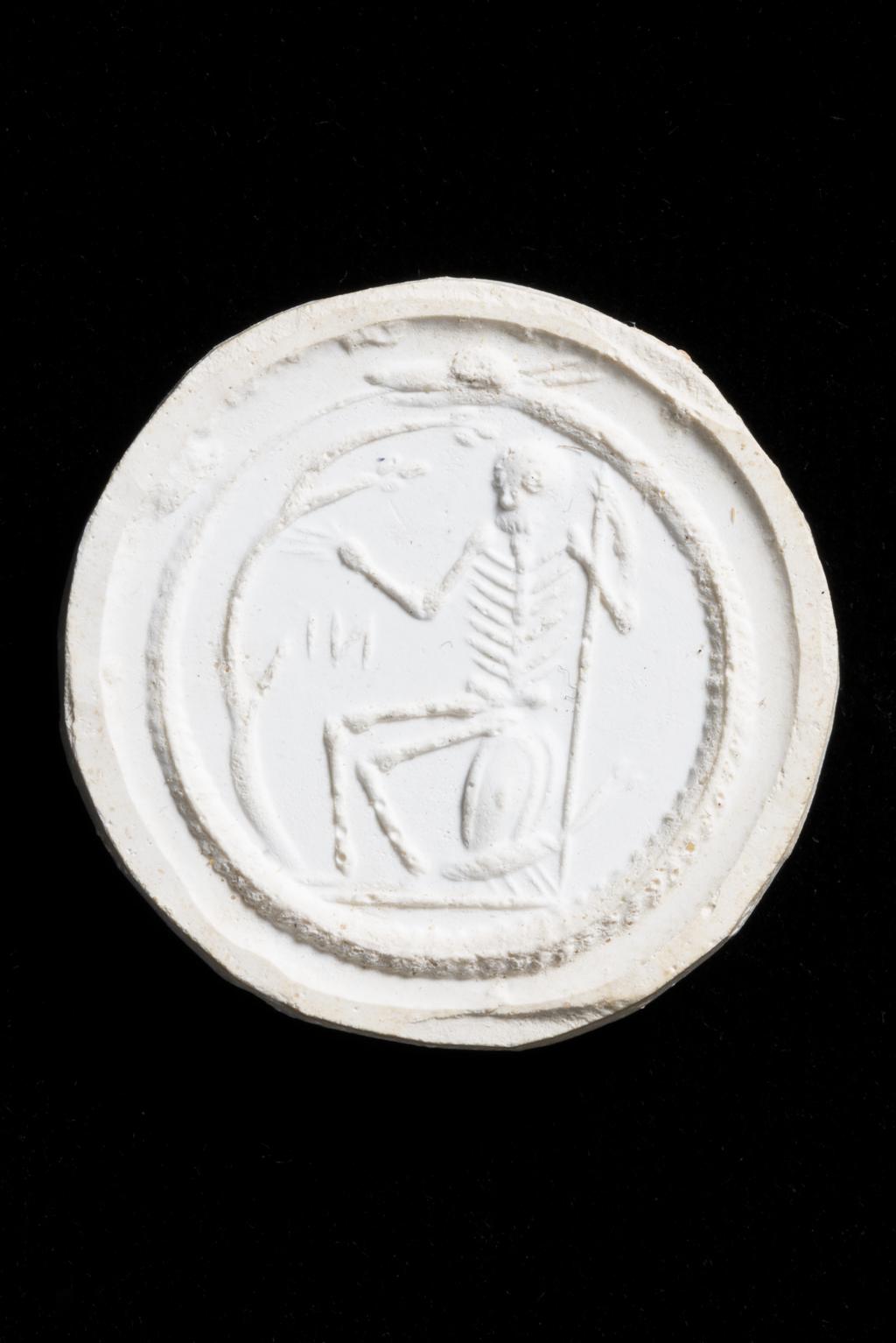 An image of Engraved gems. Magical amulet. Obverse: Tryphon. Reverse: skeleton. Intaglio cutting, jasper, 201-300. Roman.