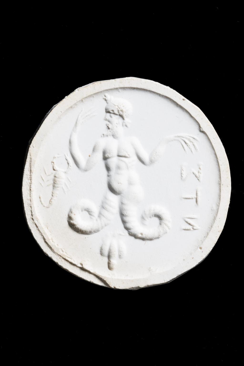 An image of Engraved gems. Magical amulet. Obverse: Tryphon. Reverse: skeleton. Intaglio cutting, jasper, 201-300. Roman.