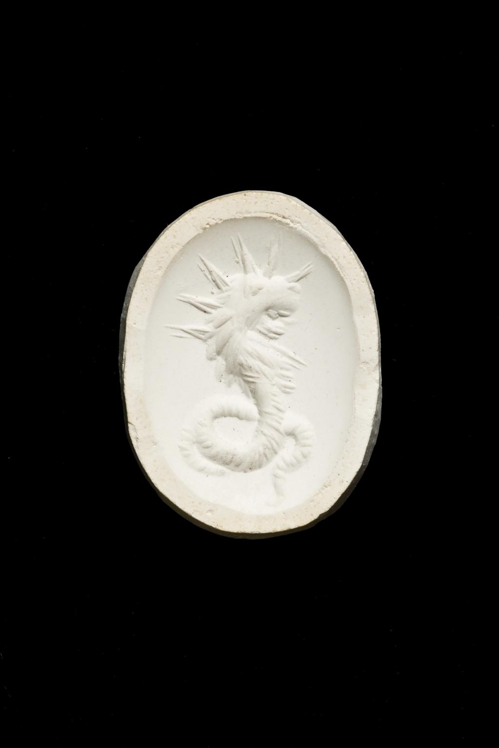 An image of Engraved gems. Magical amulet. Obverse: Chnoubis. Reverse: Inscription. Intaglio cutting, chalcedony, 101-300 AD. Roman.