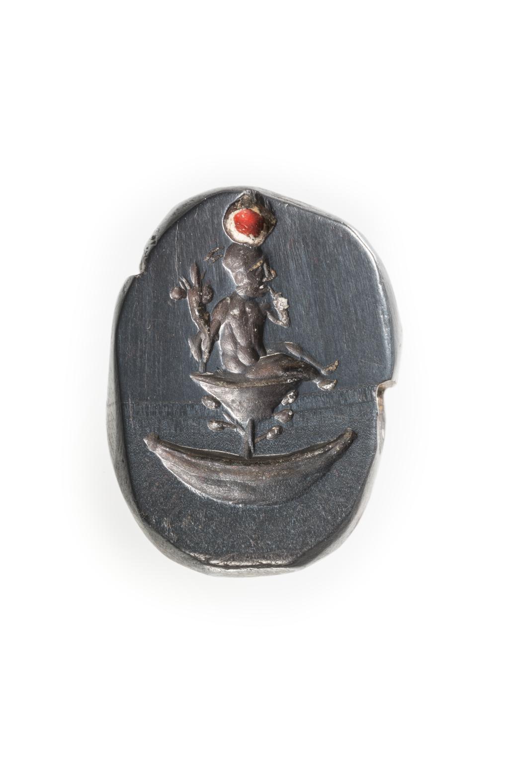 An image of Engraved gems. Magical amulet. Obverse: Horus. Intaglio cutting, hematite, 201-300 AD. Roman.
