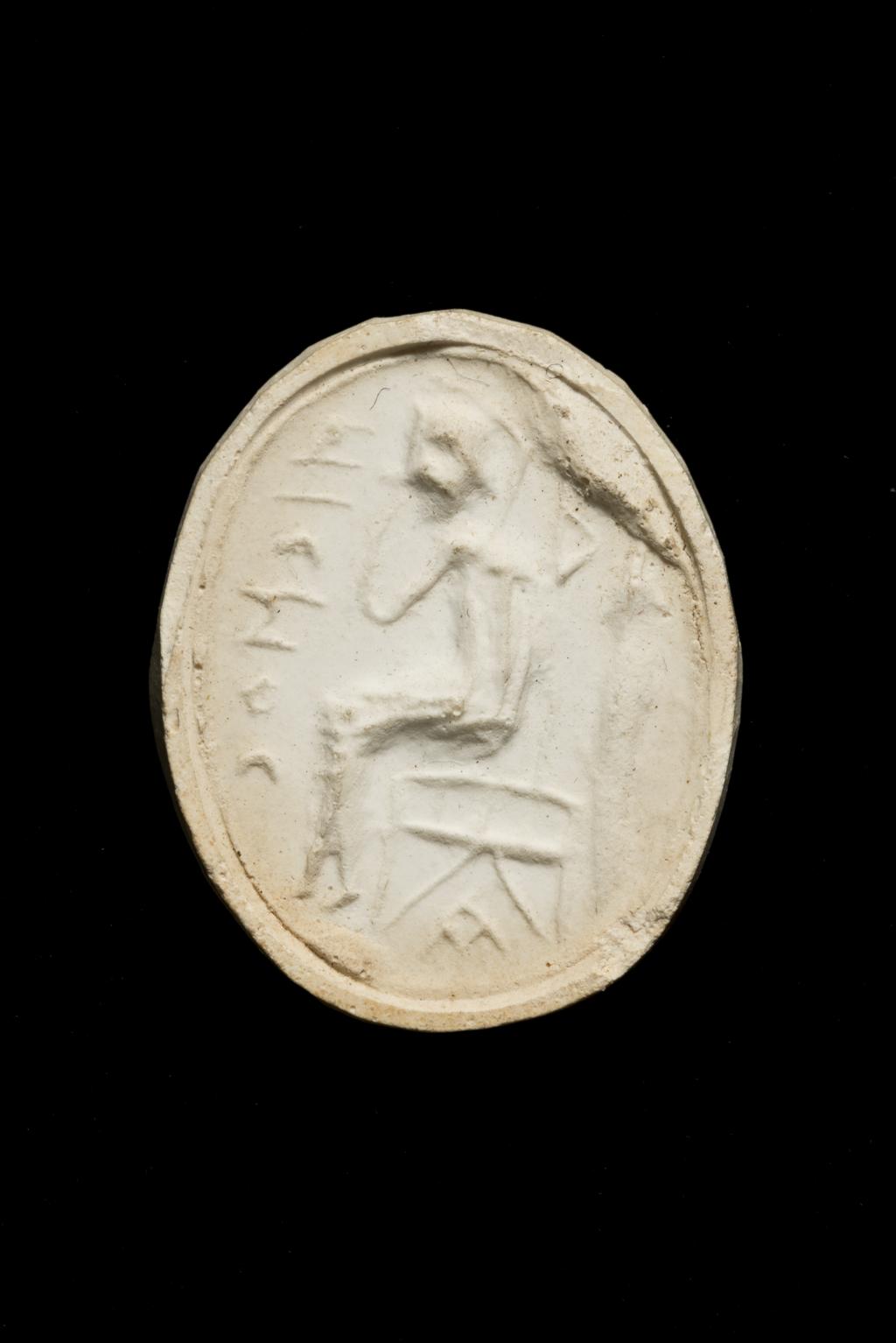 An image of Engraved gems. Magical amulet. Obverse: Horus. Reverse: Inscription. Intaglio cutting, schist, 201-400 AD. Roman.