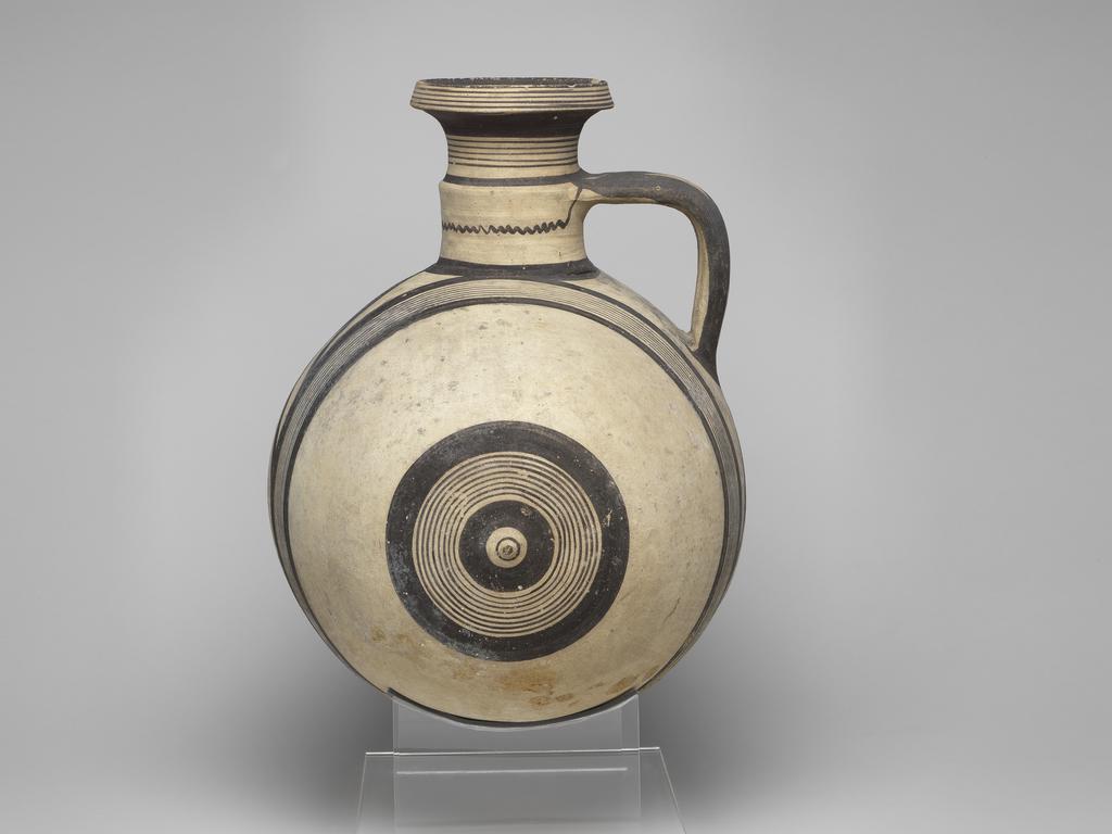 An image of Vessel/Jug. Barrel-shaped jug with concentric circles. Production Place: Cyprus. Clay. Cypriot Iron Age. Lewis Collection.
