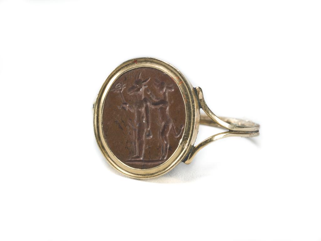 An image of Engraved gems. Magical amulet. Obverse: Anubis.  Intaglio cutting, jasper, 101-300 AD. Roman.