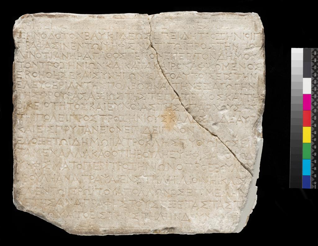 An image of Decree noting links between Halikarnassos and Troizen. Production Place: Turkey, Asia Minor. Marble, carved. 400-301 BC. Hellenistic Period.