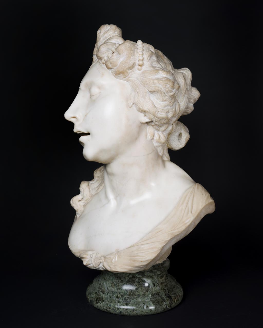 An image of Sculpture/bust. Bust of Cleopatra. Parodi, Giacomo Filippo (Italian, 1630-1702). Creamy-white marble, carved in the round, supported on a circular verde antico socle, height, bust, 78.75 cm, height, socle, 12 cm, circa 1680-1690. Baroque. Production Note: The bust was attributed to Giambologna when published in 1909 (see Documentation). It was probably made during one of Parodi's sojourns in the Veneto, Venice or Padua during the 1680s.