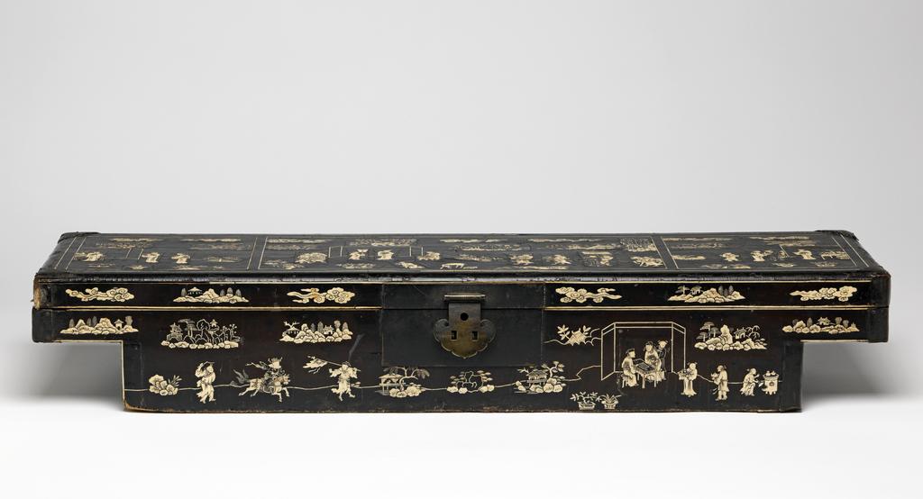 An image of Document box. Lacquer document box, with bone inlay. It is possible that this type of document box was designed to fit between the parallel carrying poles of a sedan chair. Length 76.4 cm, 1600-1699. Chinese.