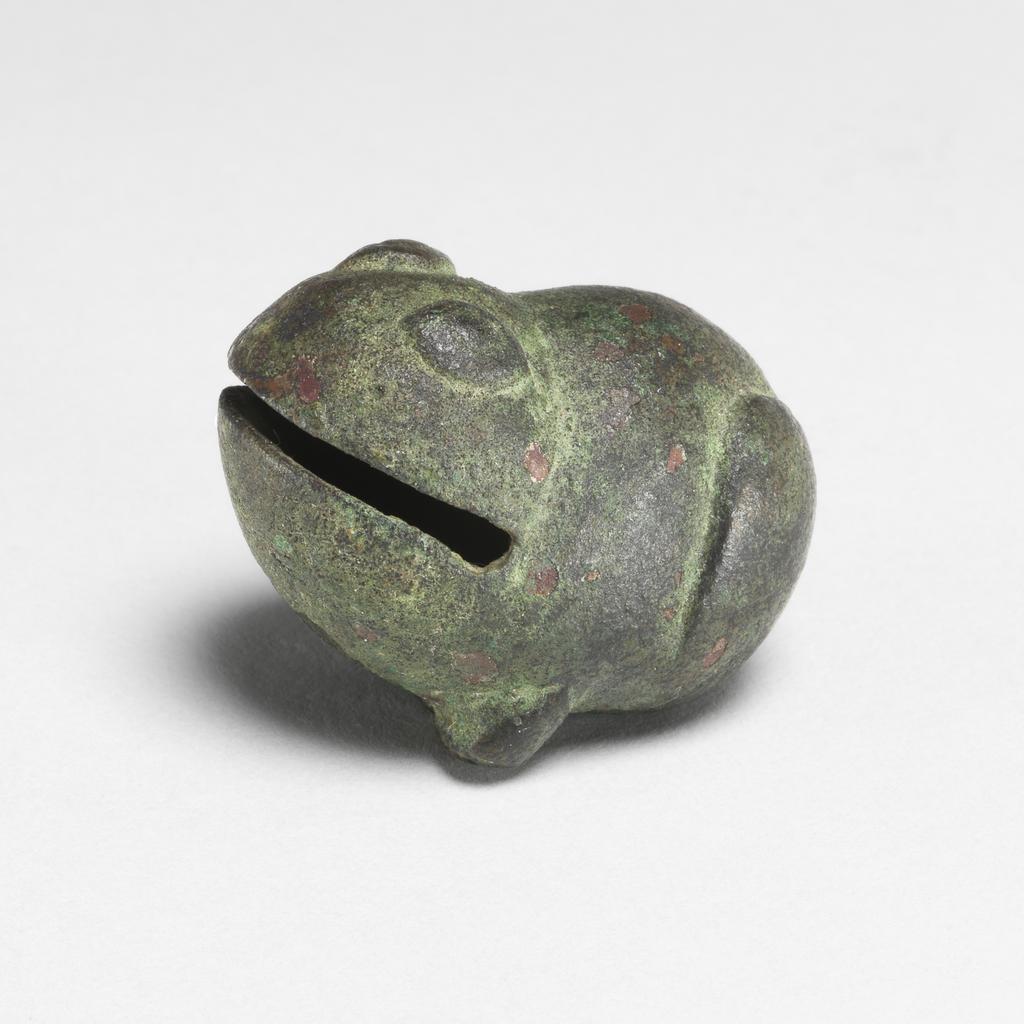 An image of Bronze bell in the form of a hollow frog, possibly from a harness. Bronze, height 4.1 cm, width 2.2 cm. Tang Dynasty (618-907). Chinese.
