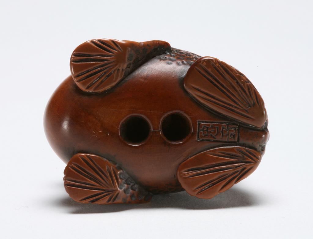 An image of Netsuke. Gama Sennin on top of a giant toad. Unknown maker, Japan. Boxwood, carved, eyes inlaid with horn, 1800-1850.
