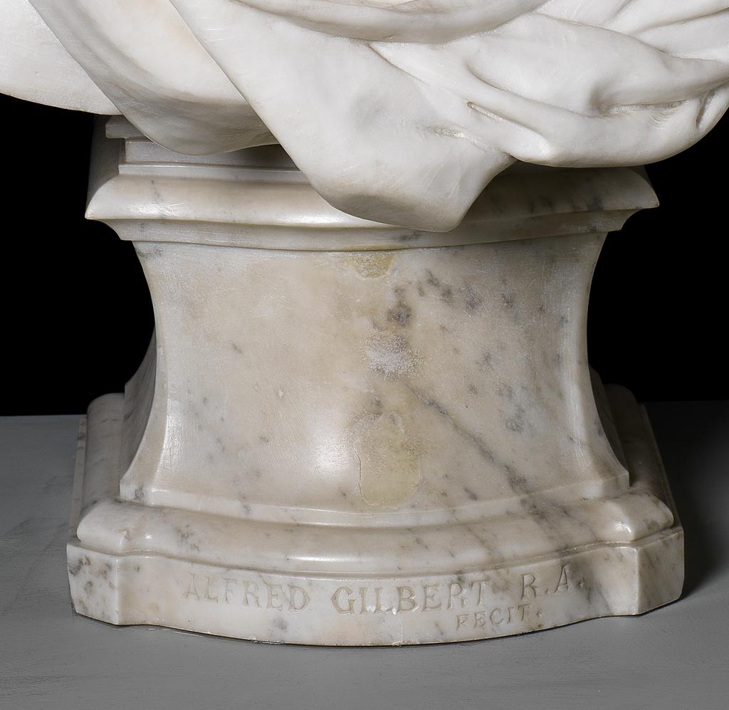An image of Bust of Queen Victoria. Queen Victoria. Gilbert, Alfred (British, 1854-1934). Carved white marble, over life-sized bust. Signed. Sculpted white marble, height 86 cm, 1887-1889. Victorian.
