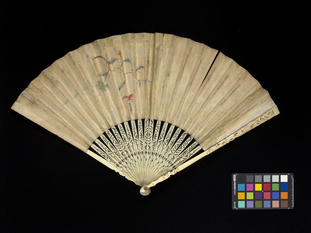 An image of Folding fan. Venus and Adonis. Unknown maker, English. Depicting Venus and Adonis. Paper leaf with hand coloured etching with gold and glitter, on pierced and fretted ivory sticks. Circa 1750. Acquisition Credit: Accepted by H. M. Government in lieu of inheritance tax from the Lennox Boyd Estate.
