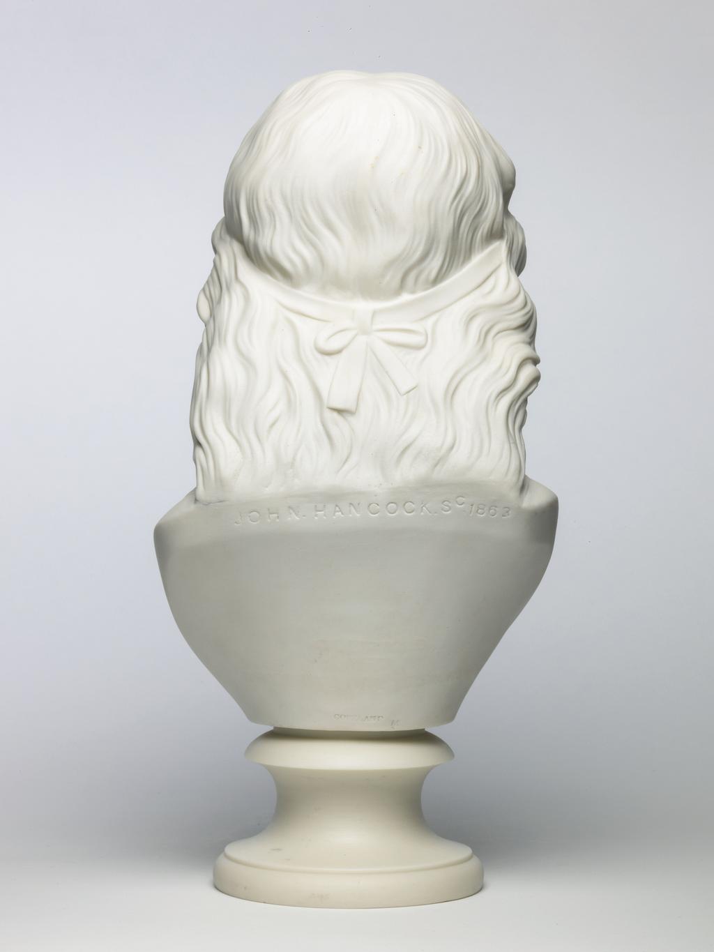 An image of Bust. Unknown lady. Copeland, Staffordshire, Stoke-on-Trent. Hancock, John, sculptor (British). Parian (porcelian), slip-cast, height 29.8 cm, length 14.3 cm, width 14.1 cm, length, base, 9.7 cm, 1863. Acquisition Credit: Accepted by H. M. Government in lieu of Inheritance Tax from the estate of G. D. V. Glynn, and allocated to the Fitzwilliam Museum.