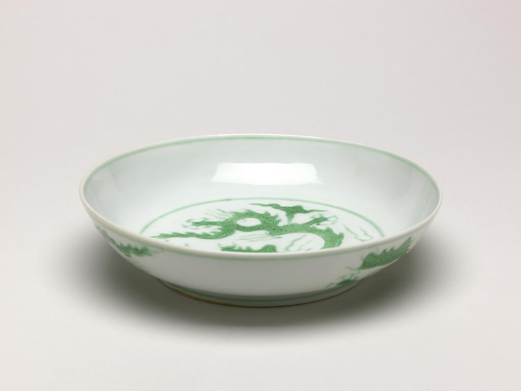 An image of Dish. Production Place: China. A green enamelled dragon dish, diameter 17.5 cm. Zhengde period (1506-1521).