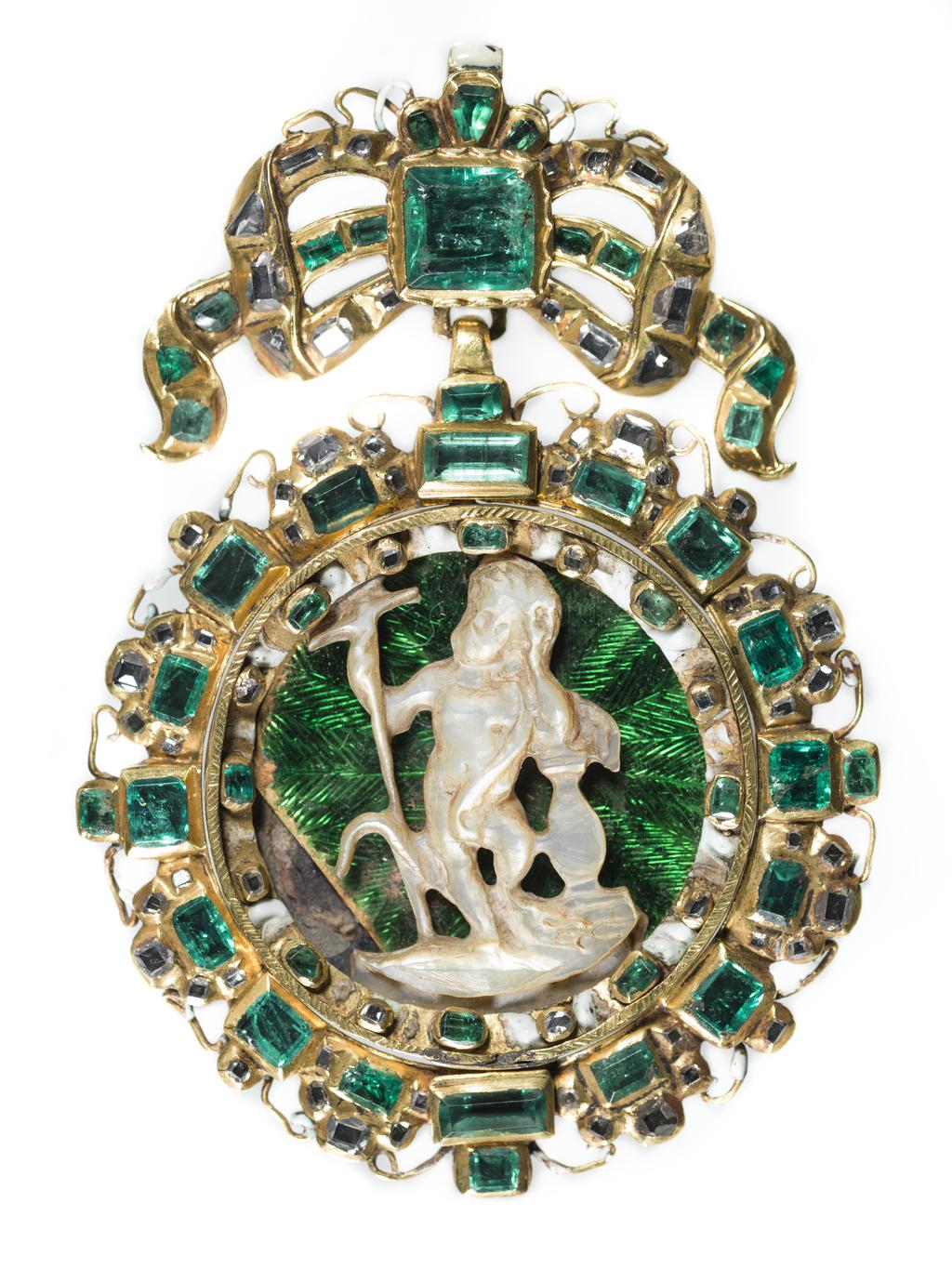 An image of Pendant/Jewellery. Gold, set with emeralds and two diamonds and a carved mother-of-pearl figure of Christ on a background of gold, engraved and enamelled in translucent green (basse-taille enamelling). The back enamelled in opaque white, pink and black and set with an enamelled plaque in blue pink and grey-black of the virgin and child. Circular with a bow at the top. Gold, basse taille enamelling, emerald decoration, mother-of-pearl carving, height, whole, 7.8 cm, width, whole, 5.4 cm, circa 1600- 1700. Spanish.