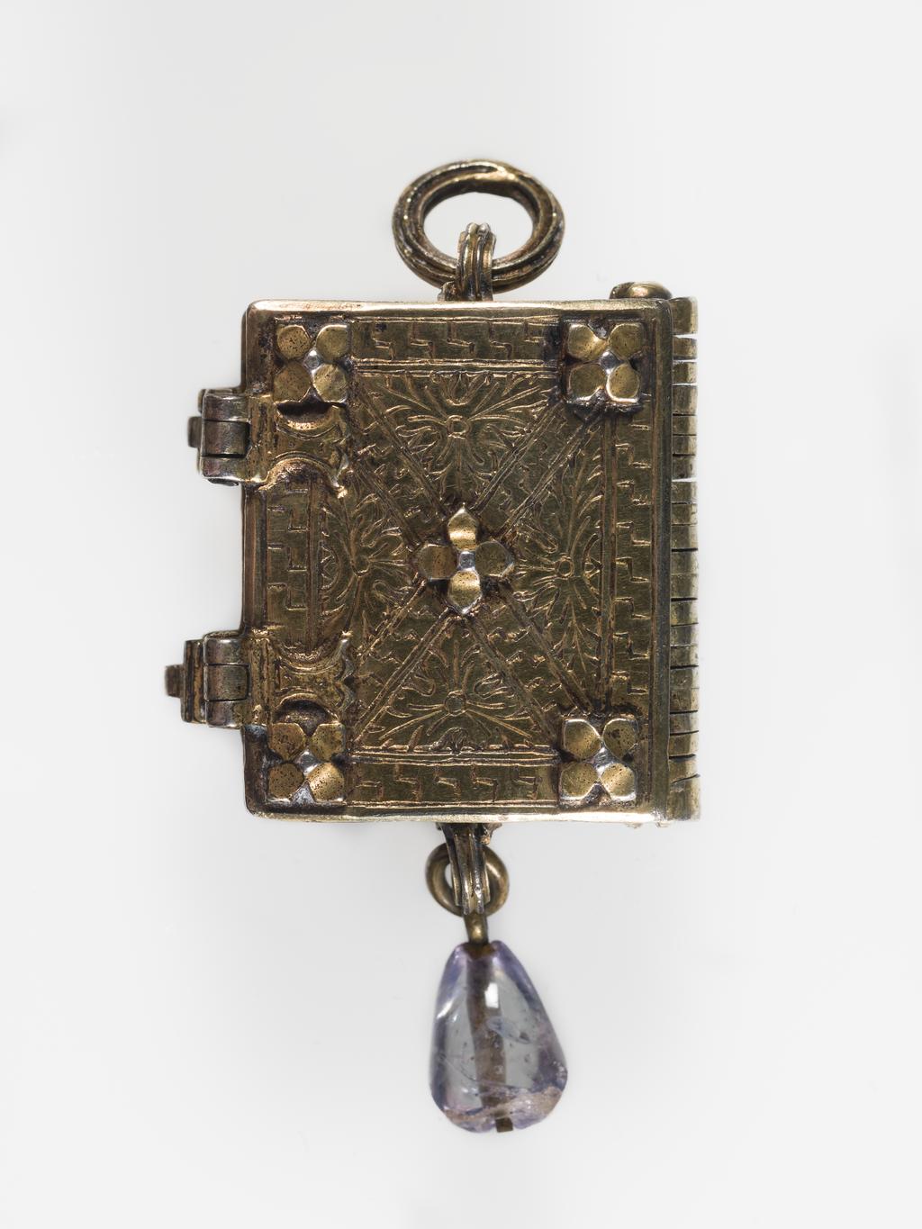 An image of Pendant Book. Jewellery/Pendant. Silver-gilt, with leaves made of silver and engraved with scenes from the Passion. Perhaps for attaching to a rosary, with pendant amethyst. Scenes: Annunciation, Nativity, Last Supper, Agony in the Garden, Kiss of Judas, Christ before Pilate, Scourying of Christ, The Mocking of Christ, Christ Carrying the Cross, the Erection of the Cross, Christ being Nailed to the Cross, the Crucifixion Deposition, Entombment, Resurrection, Christ Child Enthroned, a Pope and a female Saint. Silver-gilt, height, whole, 6.0 cm, width, whole, 2.8 cm, circa 1500- circa 1700. German.