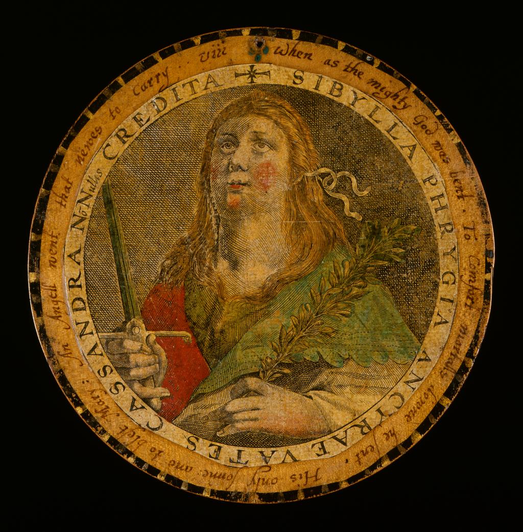 An image of Roundel or trencher. One of twelve wooden roundels, with an applied print of the Phrygian Sibyl. Hand-coloured, and inscribed in ink, diameter 13.5 cm, circa 1601-1625. Part of M.5.1-13 & A-1920: Box containing twelve roundels or trenchers. Unknown maker, after Passe, Crispijn I de, printmaker (Flemish, 1564-1637). Circular box and cover of turned wood, containing twelve roundels. Each decorated with an applied hand-coloured engraving of a Sibyl, surrounded by a hand-written English inscription. Height, box, 6.7 cm, diameter, box, 17.1 cm, diameter, roundels, 13.7 cm, circa 1601 to circa 1625.