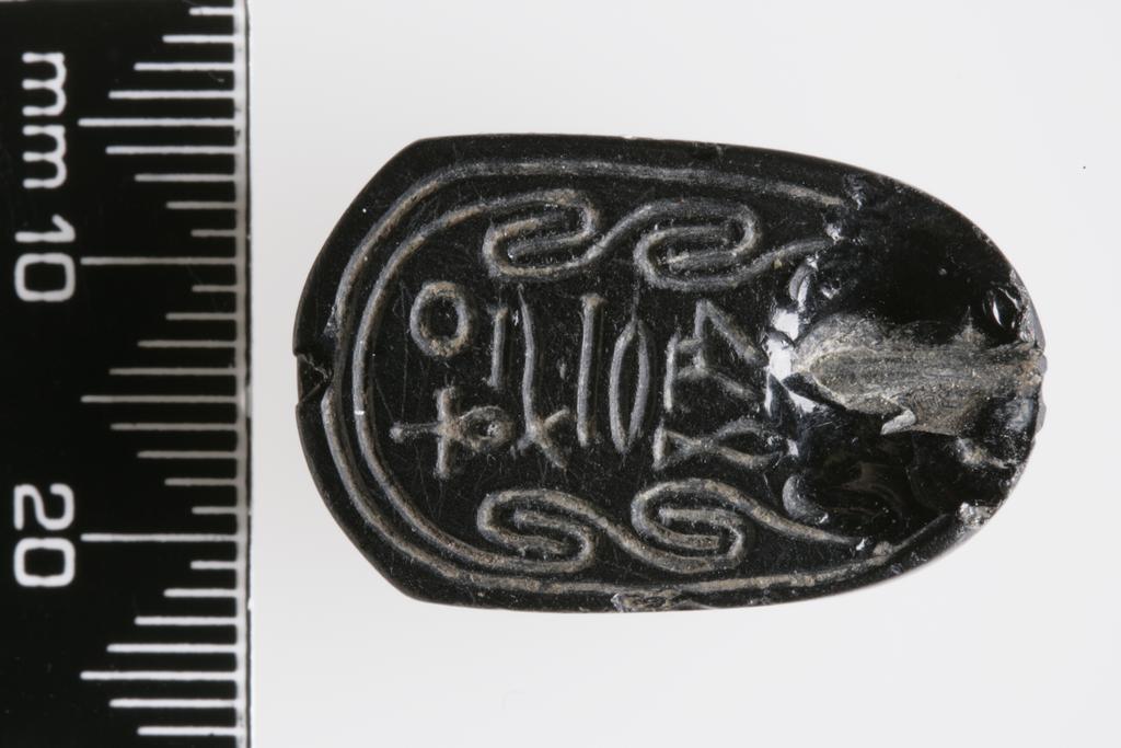 An image of Scarab. Inscribed, for 'Overseer of singers Renefankh', inside scroll border. Production Place/Find Spot: Egypt. Middle Kingdom. Late 12th dynasty.