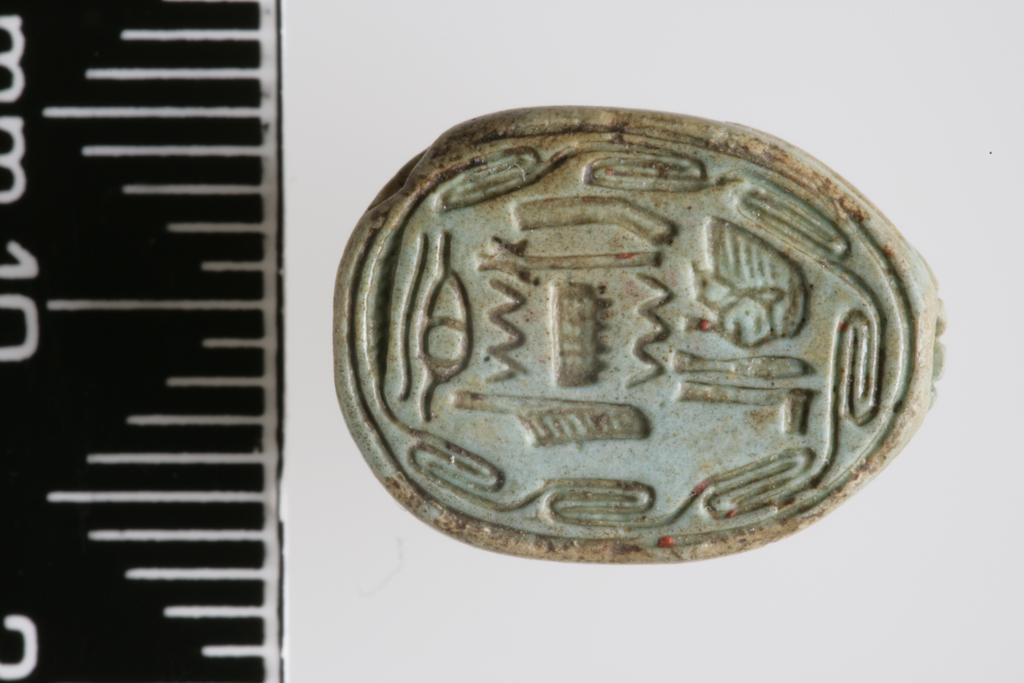 An image of Scarab. Inscribed, with 'prophet of Amun Iunres'. Production Place/Find Spot: Egypt. Depth 0.007 m, length 0.0145 m, width 0.011 m, 1600-1501 B.C. New Kingdom. Eighteenth Dynasty.