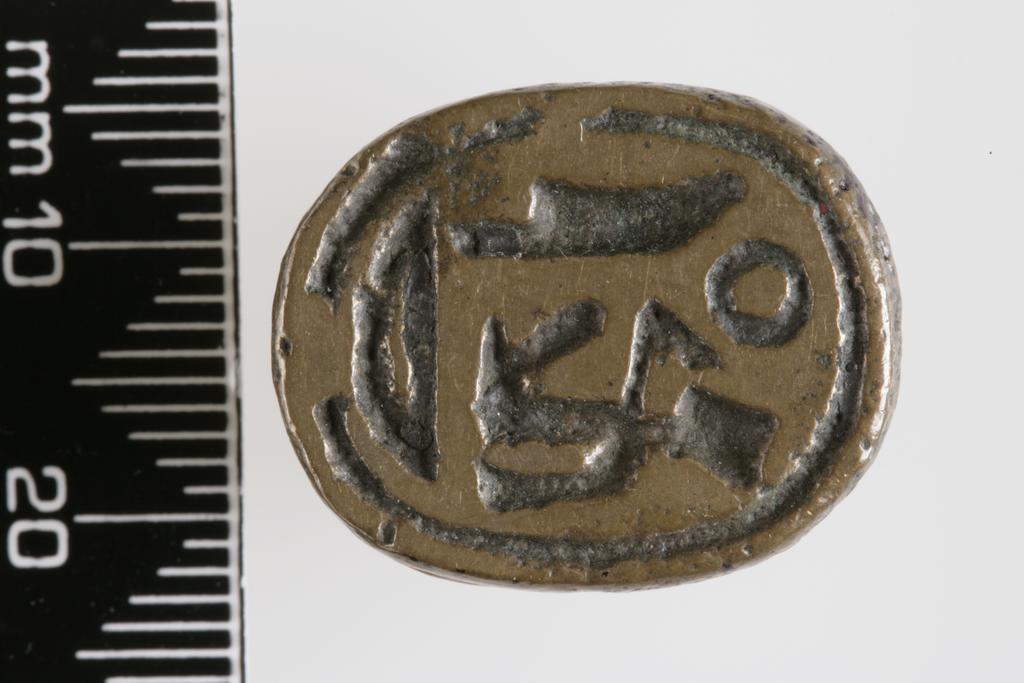 An image of Scarab. Inscribed, with hieroglyphs, not pierced. Production Place/Find Spot: Egypt. Depth 0.017 m, length 0.022 m, width 0.011 m.