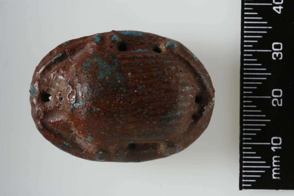 An image of Scarab. Inscribed. Production Place/Find Spot: Egypt. Depth mm, length mm, width mm.