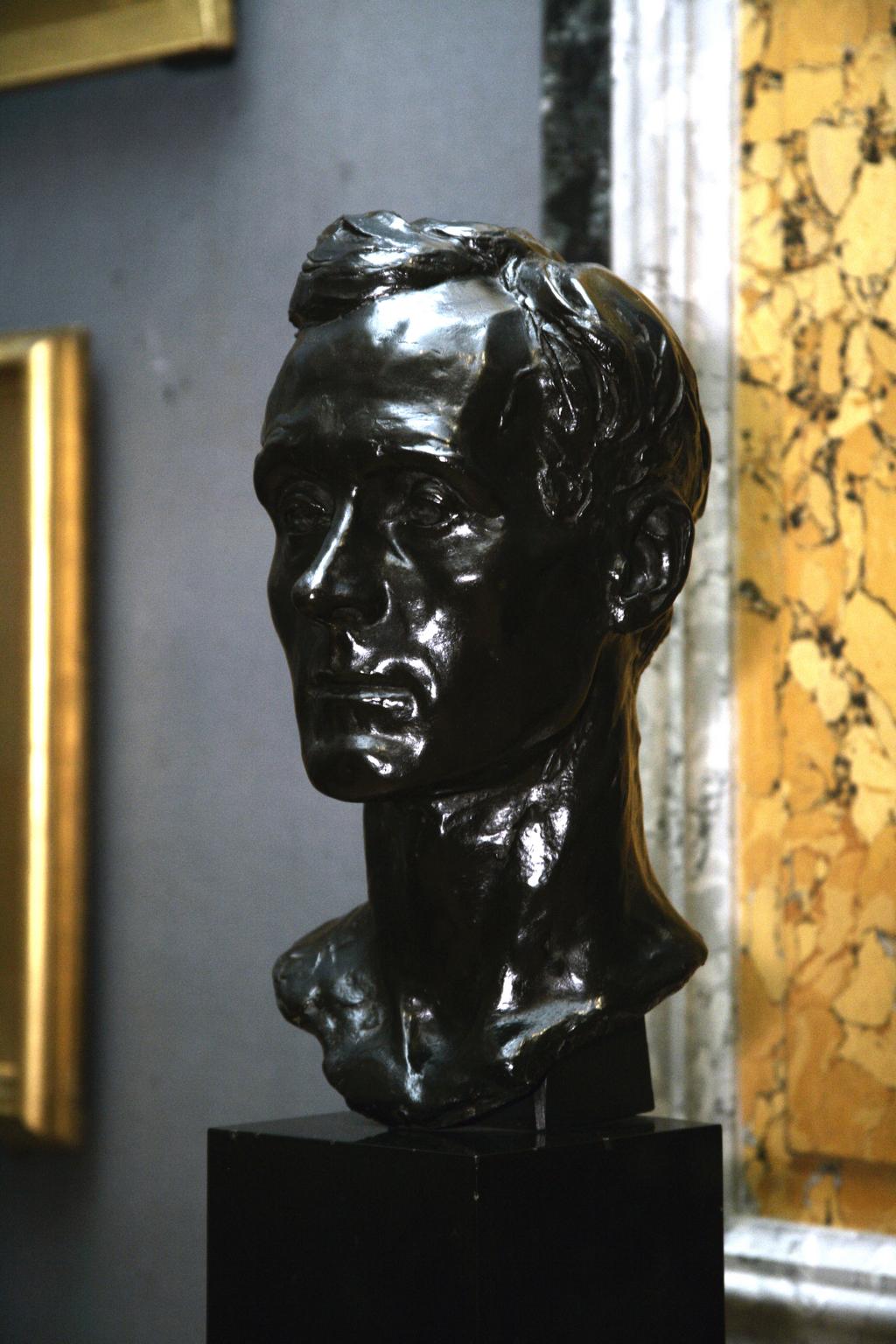 An image of In situ shot. Head of Charles H. Shannon (1863-1937). Wells, Reginald Fairfax (British, 1877-1951). The sitter is shown front view, full face. Bronze, cast, height 40.6 cm, 1900-1937.