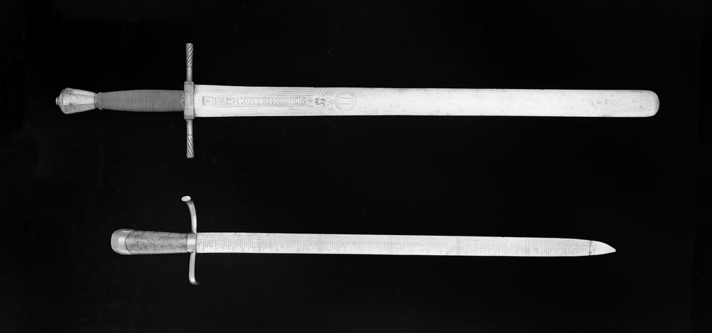 An image of Weapons. Calendar sword. Back edged blade etched with a calendar and a list of saints' days for the year. Unknown production, Germany. Steel sword, cast with etched decoration, length, blade, 70.12 cm, width, blade, 4.0 cm, circa 1540-1550.