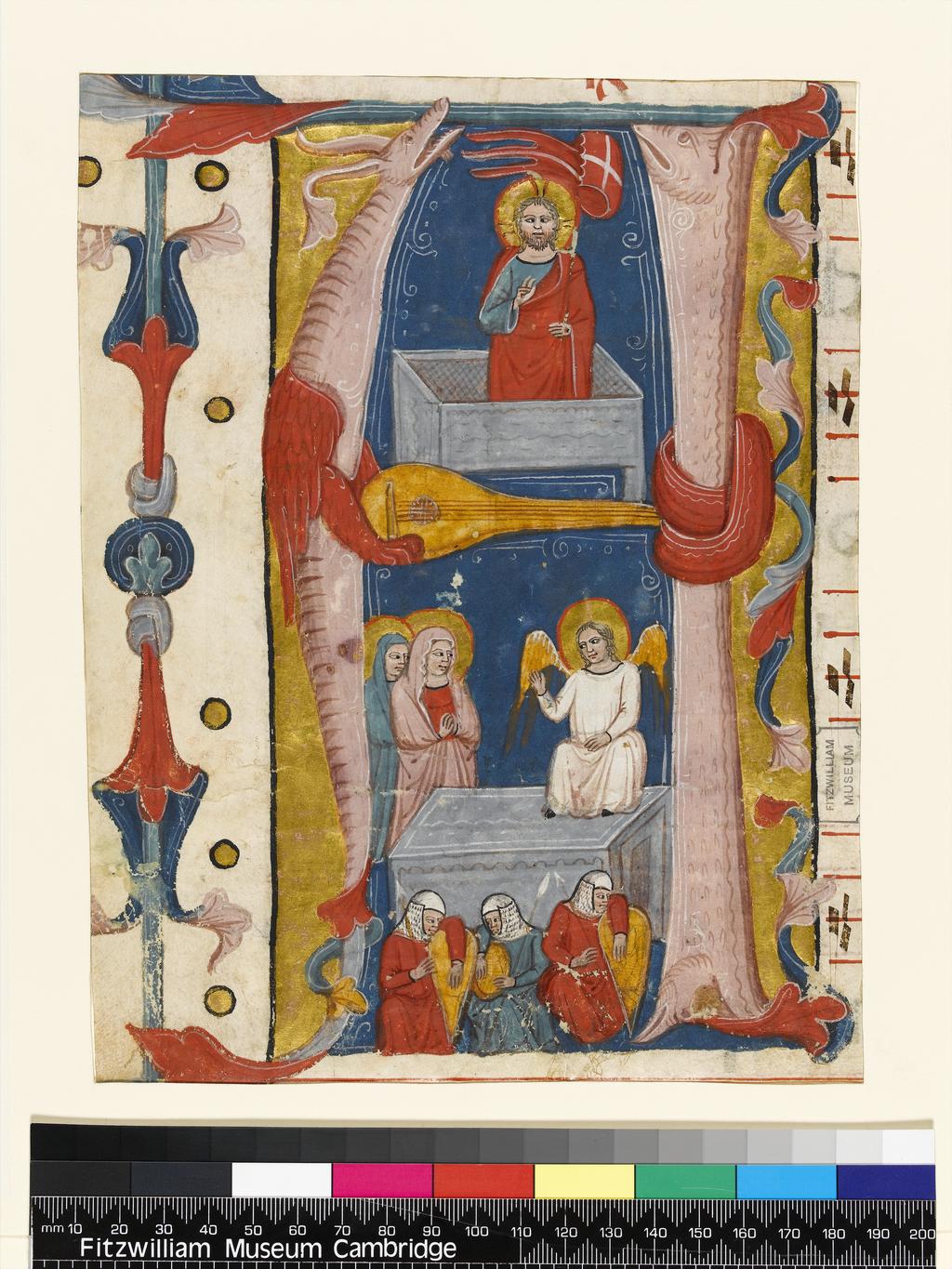 An image of Illuminated manuscript. Initial from an Antiphoner. Production Place: Central Italy. Parchment, gold, 226 x 174 mm, four musical staves ruled in red ink, four lines of fragmentary text ruled in plummet, circa 1350.CONTENTS: On reverse, the antiphons for the psalms of the first nocturn at Matins for Easter Sunday, [Postulavi patrem meum alleluia de]dit michi gentes [alleluia in here]ditatem alleluia … Evovae. A[ntiphona] Ego dor[mivi et somnu]m cepi et resurre[xi]; the initial introduced the responsory to the first lesson at Matins for Easter Sunday (Angelus domini descendit de celo), and would have been on the verso of the original leaf. DECORATION: Historiated initial, with staves formed of an elongated dragon and fish, and cross-bar formed of a stringed instrument, on a ground of solid gold with acanthus motifs extending to form border in margin: [A] The Resurrection, in the lower compartment, the angel appears to two Marys while the soldiers sleep, in the upper compartment, Christ stands triumphant in the empty tomb. ORNAMENTATION: on reverse, one red initial with brown pen flourishing, height of width between staves.
